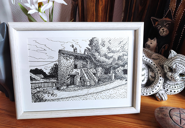 Aperçu une fois mise en cadre d'un dessin de maison en Bourgogne réalisé à la main en noir et blanc avec staedler pigment liner